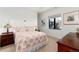 Bright bedroom with a comfortable queen-size bed at 8186 Donatello Ct, Littleton, CO 80125