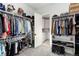 Large walk-in closet with ample shelving and hanging space at 8186 Donatello Ct, Littleton, CO 80125