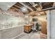 Finished basement area designed as a home office with a desk, chair, and plenty of space at 3280 Fenton St, Wheat Ridge, CO 80212