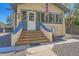 Close-up of a charming home entrance featuring a staircase and welcome sign at 3280 Fenton St, Wheat Ridge, CO 80212