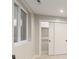 Basement closet with sliding doors and a window offering natural light at 2552 E Alameda Ave # 92, Denver, CO 80209