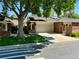 Charming brick home with mature trees and a well-maintained lawn, offering great curb appeal at 2552 E Alameda Ave # 92, Denver, CO 80209