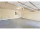 Spacious garage with sealed floor and an automatic door opener at 2552 E Alameda Ave # 92, Denver, CO 80209