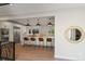 Open-concept kitchen with a large island, stylish pendant lighting, and a seamless flow into the dining area at 2552 E Alameda Ave # 92, Denver, CO 80209