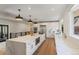Spacious kitchen with a large center island, stainless steel appliances, and plenty of counter space at 2552 E Alameda Ave # 92, Denver, CO 80209
