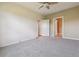 Carpeted bedroom boasts two closets and two entrances into the bedroom at 11972 W Long Cir # 104, Littleton, CO 80127
