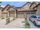 Exterior view of townhome with 3 car garages at 11972 W Long Cir # 104, Littleton, CO 80127