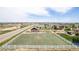 Aerial view of a home with a large, fenced lot and outdoor features at 10653 E 163Rd Ct, Brighton, CO 80602