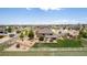 Aerial image showcasing the home's expansive backyard and outdoor dining at 10653 E 163Rd Ct, Brighton, CO 80602