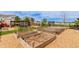 Backyard with garden beds at 10653 E 163Rd Ct, Brighton, CO 80602