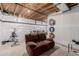 Unfinished basement area featuring a sitting area at 10653 E 163Rd Ct, Brighton, CO 80602