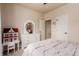 Bedroom showcasing white furniture, neutral walls, and soft carpeting for a cozy feel at 10653 E 163Rd Ct, Brighton, CO 80602