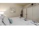 Bedroom featuring a closet, neutral walls, and a comfortable bed at 10653 E 163Rd Ct, Brighton, CO 80602