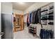 Spacious walk-in closet with ample storage and an infrared sauna at 10653 E 163Rd Ct, Brighton, CO 80602