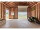 Open garage with lawn equipment and expansive views of surrounding landscape at 10653 E 163Rd Ct, Brighton, CO 80602