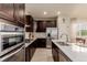 Modern kitchen with stainless steel appliances, a gas range and white countertops at 10653 E 163Rd Ct, Brighton, CO 80602