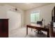 Home office space with a desk, chair, and closet, ideal for remote work or study at 10653 E 163Rd Ct, Brighton, CO 80602