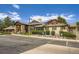 Community clubhouse with ample guest parking spots and lush landscaping at 7493 S Quail Cir # 928, Littleton, CO 80127