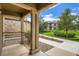 Inviting front porch features a stone exterior and professional landscaping at 7493 S Quail Cir # 928, Littleton, CO 80127
