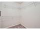 Empty walk-in closet with wire shelving and carpet at 7493 S Quail Cir # 928, Littleton, CO 80127