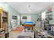 Finished bonus room with a pool table, kitchenette, and space for entertainment at 3270 Depew St, Wheat Ridge, CO 80212