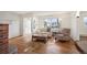 Cozy living room with lots of natural light, and an open concept living space at 4731 S Acoma St, Englewood, CO 80110