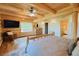 Log cabin bedroom with a bed, hardwood floors, a window view and en suite bathroom at 13525 Woodmoor West Dr, Larkspur, CO 80118