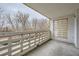Balcony with block railing and views of mature trees and foliage at 655 S Alton Way # 6C, Denver, CO 80247