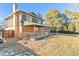 View of the home's backyard and deck at 7649 E Amherst Ave, Denver, CO 80231