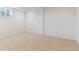 Finished basement room with a neutral carpet, and a window at 7649 E Amherst Ave, Denver, CO 80231
