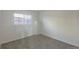 Cozy bedroom with neutral carpeting, a window for natural light, and ample space at 17325 E Rice Cir # F, Aurora, CO 80015