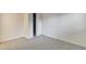 Comfortable carpeted bedroom featuring a built in closet and good natural lighting at 17325 E Rice Cir # F, Aurora, CO 80015