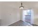 Bright dining area with wood floors and sliding glass doors leading to an outdoor deck at 17325 E Rice Cir # F, Aurora, CO 80015