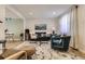 Inviting living room with stylish decor, comfortable seating, and laminate flooring at 3376 Jasmine St, Denver, CO 80207