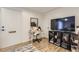 Office space with wooden desk and chair and laminate flooring at 3376 Jasmine St, Denver, CO 80207