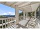 Open deck with white trim and views of the mountains in the distance at 426 Buena Vista Rd, Golden, CO 80401