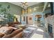 Spacious living room with vaulted ceilings, a fireplace, comfortable seating, and an open layout at 426 Buena Vista Rd, Golden, CO 80401