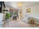 Comfortable living room with a sofa, glass table, and large window with a view at 426 Buena Vista Rd, Golden, CO 80401