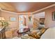 Spacious living room with comfortable seating and a view into the dining area and entryway at 426 Buena Vista Rd, Golden, CO 80401