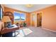 Office space with a large window and a view of the mountains at 426 Buena Vista Rd, Golden, CO 80401
