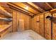 Interior of shed shows storage space with wooden walls and shelves at 8120 W 54Th Pl, Arvada, CO 80002