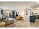 Inviting living room with a walkout balcony, light hardwood floors, and a neutral color palette at 5120 Williams Fork Trl # 214, Boulder, CO 80301