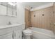 Bathroom features a combined bathtub/shower and vanity with storage at 9240 E Girard Ave # 1, Denver, CO 80231