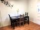 Well-lit dining area with a table set for four, complemented by modern decor at 9240 E Girard Ave # 1, Denver, CO 80231