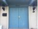 Image of the home's front double-doors with an address of 9450 and white-painted brickwork at 9240 E Girard Ave # 1, Denver, CO 80231