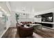 Inviting living room offers comfortable seating and modern entertainment center at 9240 E Girard Ave # 1, Denver, CO 80231