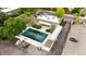 Aerial view of a community pool with ample parking and green spaces at 9240 E Girard Ave # 1, Denver, CO 80231