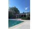 Outdoor swimming pool, perfect for relaxing and enjoying sunny days with beautiful landscaping at 9240 E Girard Ave # 1, Denver, CO 80231