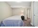 Bedroom featuring a single bed with striped bedding, and neutral walls at 6655 S Elm Cir, Centennial, CO 80121
