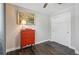 Bright bedroom features hardwood floors, a decorative dresser, a ceiling fan, and ample closet space at 6655 S Elm Cir, Centennial, CO 80121